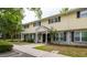Charming townhouse with yellow siding, brick accents, and manicured landscaping at 507 Stinson Dr # B3, Charleston, SC 29407