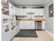 Clean kitchen with white cabinets, wood countertop, and stainless steel appliances at 507 Stinson Dr # B3, Charleston, SC 29407