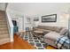 Inviting living room with a sectional sofa, modern decor, and hardwood floors at 507 Stinson Dr # B3, Charleston, SC 29407