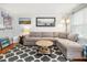 Comfortable living room featuring a large sofa, stylish rug, and ample natural light at 507 Stinson Dr # B3, Charleston, SC 29407