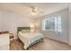 Bright bedroom with hardwood floors, a ceiling fan, and natural light from the exterior window at 516 Arlington Dr # B4, Charleston, SC 29414