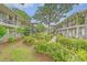 Well-manicured courtyard in a brick apartment complex offering communal green space and outdoor enjoyment at 516 Arlington Dr # B4, Charleston, SC 29414
