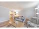 Inviting living area showcasing wood floors, open layout to the kitchen and a cozy seating arrangement at 516 Arlington Dr # B4, Charleston, SC 29414