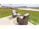 Backyard patio with comfortable seating and beautiful community views at 519 Purple Finch Rd, Summerville, SC 29486