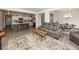 Spacious living room with an open floor plan, leading into a modern kitchen at 519 Purple Finch Rd, Summerville, SC 29486