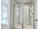 Modern bathroom featuring a glass-enclosed shower and a separate bathtub for the ultimate relaxation experience at 523 Purple Finch Rd, Summerville, SC 29486