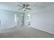 Spacious upstairs room featuring neutral walls and carpet with access to another room at 523 Purple Finch Rd, Summerville, SC 29486
