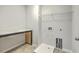 Functional laundry room with a utility sink and counter space for folding and organizing laundry essentials at 523 Purple Finch Rd, Summerville, SC 29486