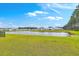 Picturesque view of the pond and surrounding community, ideal for a peaceful and tranquil lifestyle at 523 Purple Finch Rd, Summerville, SC 29486