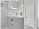 Modern bathroom with a sleek glass shower, neutral tones, and convenient inset shelving for toiletries at 5541 Alpine Dr, Summerville, SC 29483