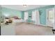 Bright bedroom with gold polka dot accent wall, carpeted floor, white trim, and plenty of natural light at 5541 Alpine Dr, Summerville, SC 29483