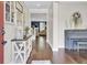 Elegant foyer featuring hardwood floors, stylish decor, and a glimpse into the inviting living spaces at 5541 Alpine Dr, Summerville, SC 29483