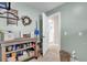 Well-organized laundry room featuring custom shelving, decor, and fresh, clean storage solutions at 5541 Alpine Dr, Summerville, SC 29483