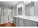 The bathroom includes a double vanity, a seamless shower, and modern faucets with new fixtures at 596 Wayton Cir, Moncks Corner, SC 29461