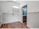 Spacious entryway leads to a modern bathroom with a wooden vanity at 596 Wayton Cir, Moncks Corner, SC 29461