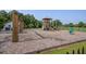 A wooden playground and other outdoor play equipment offers a fun and engaging play space for children at 596 Wayton Cir, Moncks Corner, SC 29461