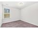Bedroom with plush carpet, a window and neutral paint at 7787 Montview Rd, North Charleston, SC 29418