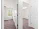 Bedroom with plush carpet, a window and neutral paint at 7787 Montview Rd, North Charleston, SC 29418