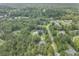 A beautiful aerial view of the neighborhood with mature trees, with a view of the community and the property at 800 Enclave Ter, Summerville, SC 29483