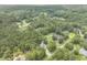 A tranquil aerial shot of the property in a lush community with plentiful tree coverage and neighborhood at 800 Enclave Ter, Summerville, SC 29483