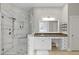 Modern bathroom with walk-in shower, glass enclosure, and spacious vanity with granite countertop at 800 Enclave Ter, Summerville, SC 29483