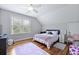 Cozy bedroom with an attic ceiling, plush rugs, and hardwood floors at 800 Enclave Ter, Summerville, SC 29483