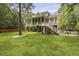 Beautiful home with a spacious backyard, screened-in porch, and a well-maintained lawn at 800 Enclave Ter, Summerville, SC 29483