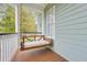 Inviting porch with a relaxing swing and overhead coverage at 800 Enclave Ter, Summerville, SC 29483