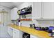 Functional garage area with workbench, storage cabinets, and organized tool storage at 800 Enclave Ter, Summerville, SC 29483
