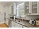 Well-equipped kitchen with granite countertops, stainless steel appliances, and ample cabinet space at 800 Enclave Ter, Summerville, SC 29483