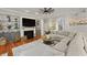 Inviting living room boasts a cozy fireplace, built-in shelving, and a comfortable sectional couch at 800 Enclave Ter, Summerville, SC 29483