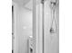 Close-up of modern shower with marble-look tile, chrome fixtures, and glass enclosure at 800 Enclave Ter, Summerville, SC 29483