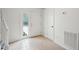 Bright entryway with natural light, showcasing tile flooring, a glass-panel door, and convenient closet space at 801 Ventura Pl, Mount Pleasant, SC 29464