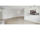 Inviting living room with a tiled floor and bar access to kitchen at 801 Ventura Pl, Mount Pleasant, SC 29464
