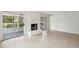 Cozy living room with a fireplace and sliding glass doors to the outside at 801 Ventura Pl, Mount Pleasant, SC 29464