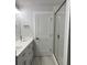 Bathroom with double vanity and walk-in shower at 819 Burger St, Charleston, SC 29407