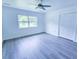 Light-filled bedroom with a view and closet at 840 Brittle Bank Rd, Walterboro, SC 29488