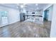 Open concept kitchen with stainless steel appliances, an island and a view to the yard at 840 Brittle Bank Rd, Walterboro, SC 29488