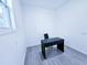 A modern office space with a desk and chair situated in front of a window for natural light at 840 Brittle Bank Rd, Walterboro, SC 29488