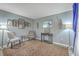 Comfortable living room showcasing an area rug, lamps, and Egyptian art at 100 Hunters Wood Dr, Summerville, SC 29485