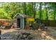 Backyard featuring a shed, fire pit, and various items at 1004 Miles Jamison Rd, Summerville, SC 29485