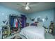 Bedroom featuring blue walls, bed, closet, and mirror at 1004 Miles Jamison Rd, Summerville, SC 29485