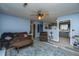 Living room featuring wood floors and views to the kitchen area at 1004 Miles Jamison Rd, Summerville, SC 29485