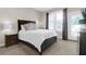Cozy bedroom with neutral tones, large windows, and a comfortable bed with stylish bedding at 1014 Rosewood Ln, Mount Pleasant, SC 29464