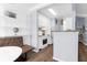 Modern kitchen with white cabinets, stainless steel appliances, and breakfast bar seating at 1014 Rosewood Ln, Mount Pleasant, SC 29464