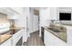 Clean, functional kitchen featuring stainless steel appliances, granite countertops, and white cabinetry at 1014 Rosewood Ln, Mount Pleasant, SC 29464