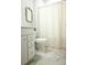 Bright bathroom with a vanity, toilet, tub, and shower with patterned floors at 1030 Grace Field Ave, Summerville, SC 29485