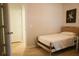 Bright bedroom with a twin bed, white walls, and a view of the closet at 1030 Grace Field Ave, Summerville, SC 29485