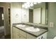Bathroom featuring a dual sink vanity, bright lighting, and ample storage space at 1044 Academy Rd, Walterboro, SC 29488