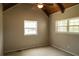Bedroom with carpet, two windows, and high wood ceilings at 1044 Academy Rd, Walterboro, SC 29488